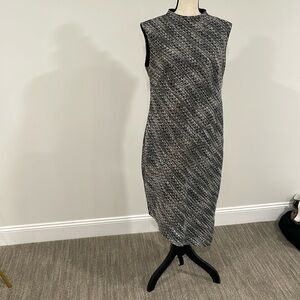 Black and white a-line dress. Knit material. Flattering cut